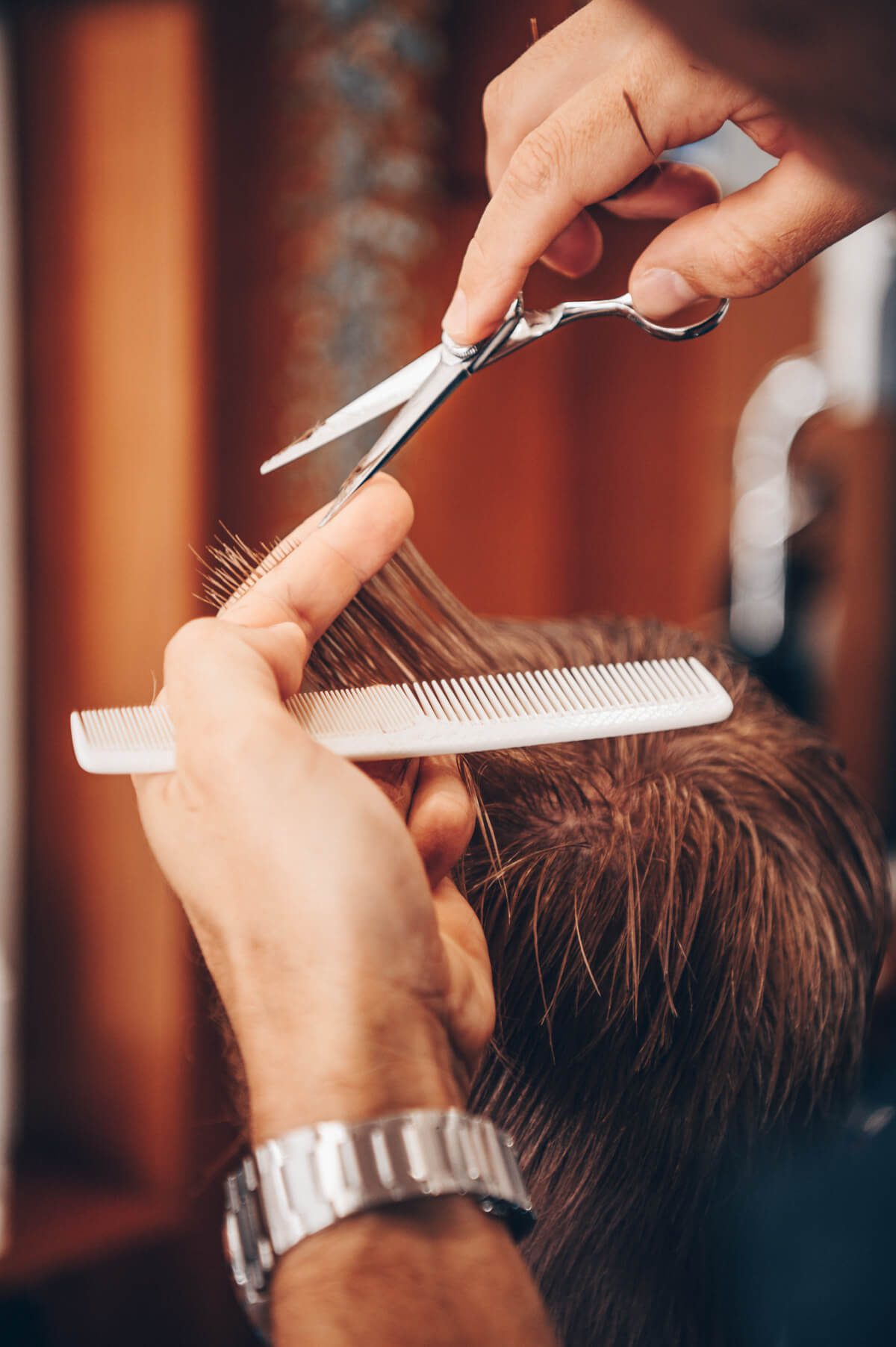 Scissors and comb refining a precision haircut
