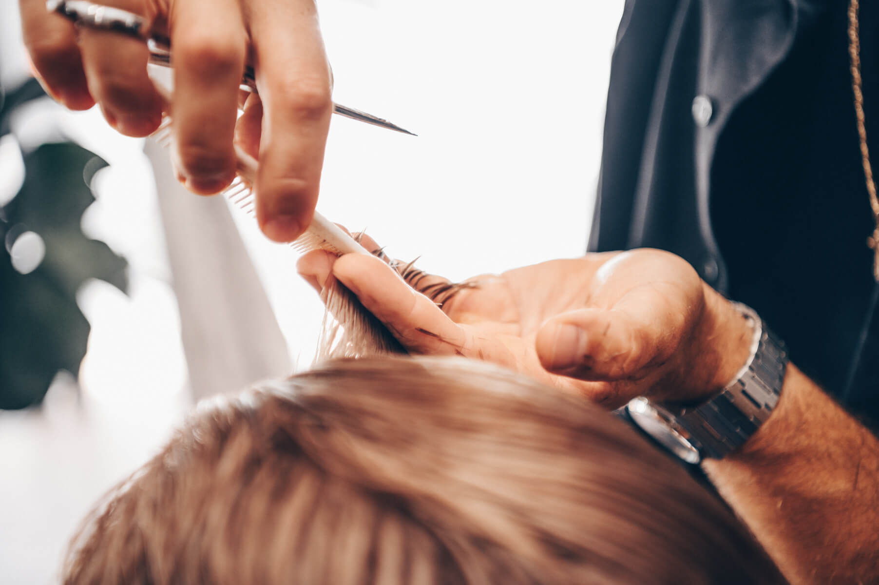 A precision haircut at Juicy Golden